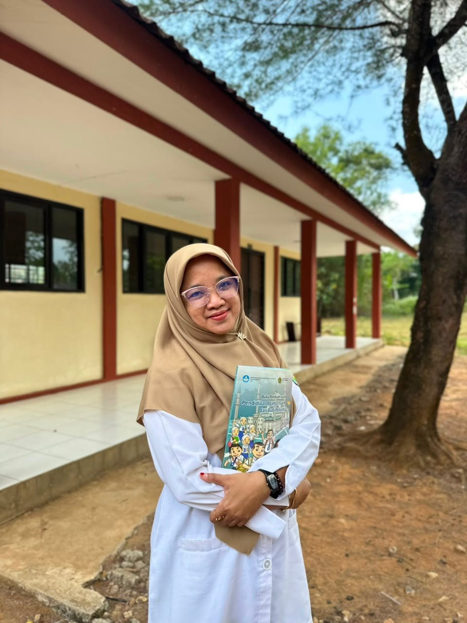 Kuratul Fauza, S.Pd